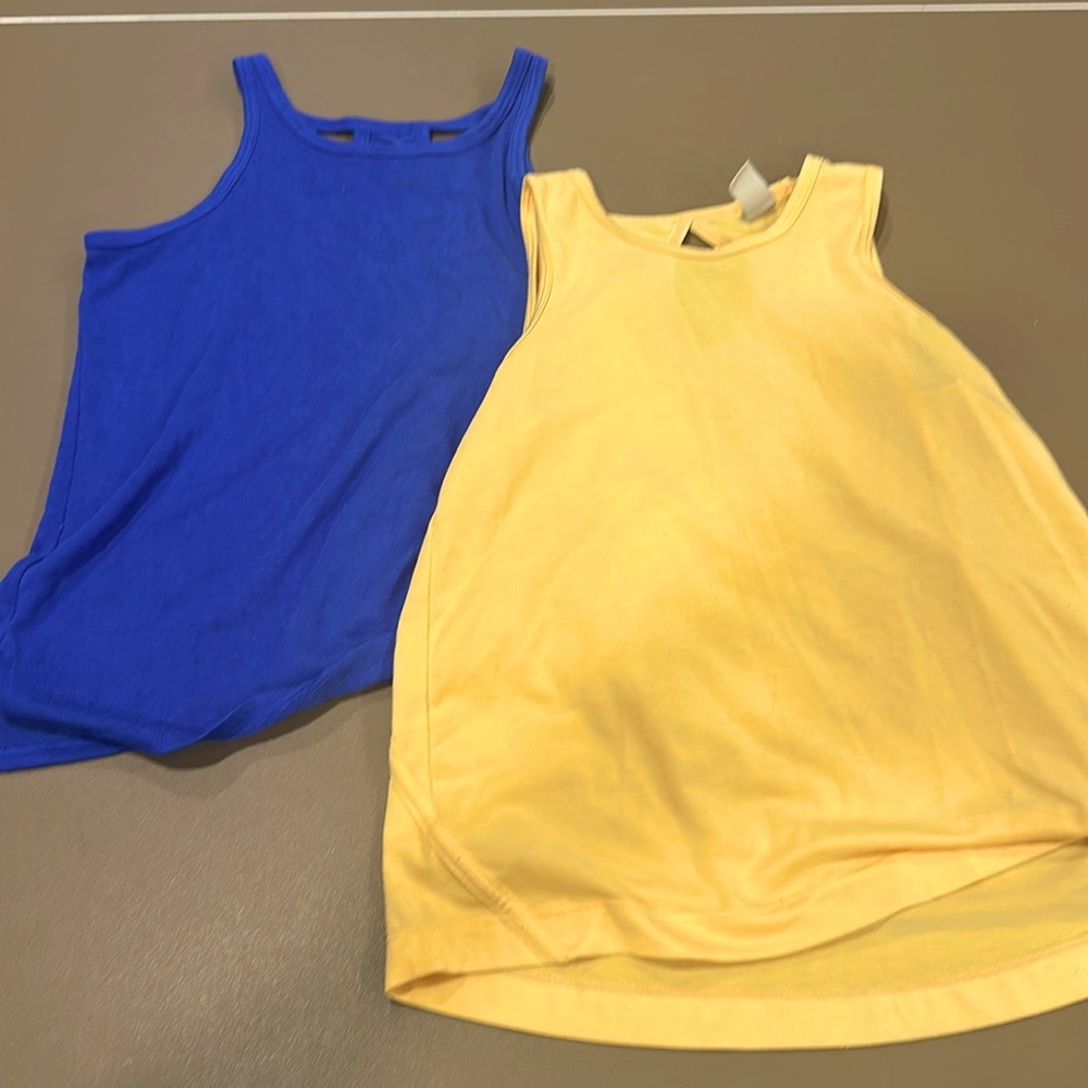 Two Athleta Girl Tanks - Size Medium